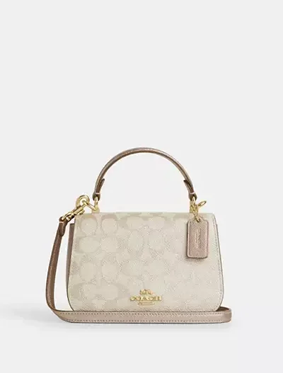 Lysa Top Handle Bag In Signature Canvas